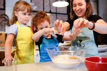 Family engaged in cooking